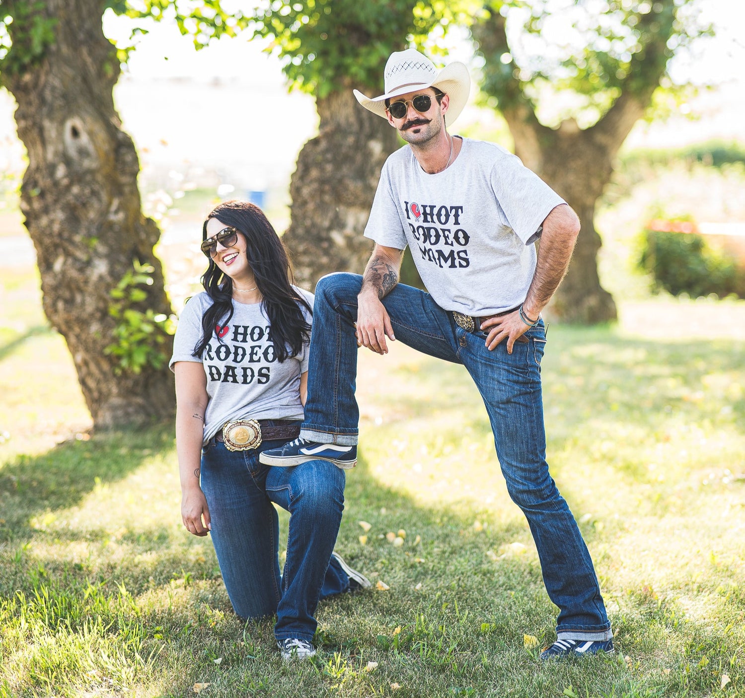 two people wearing hot rodeo moms and hot rodeo dads shirts at the comedy ranch